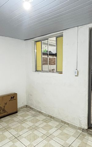 Casa à venda com 36m², 2 quartos e 1 vaga Casa à venda com 36m², 2 quartos e 1 vagaQuarto da Garagem