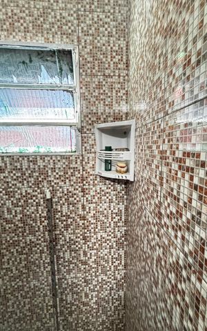 Casa à venda com 36m², 2 quartos e 1 vaga Casa à venda com 36m², 2 quartos e 1 vagaBanheiro