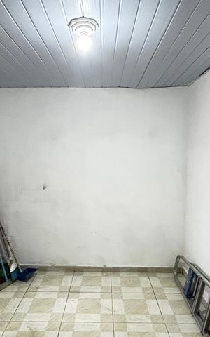 Casa à venda com 36m², 2 quartos e 1 vaga Casa à venda com 36m², 2 quartos e 1 vagaQuarto da Garagem