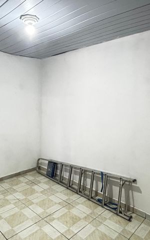 Casa à venda com 36m², 2 quartos e 1 vaga Casa à venda com 36m², 2 quartos e 1 vagaQuarto da Garagem