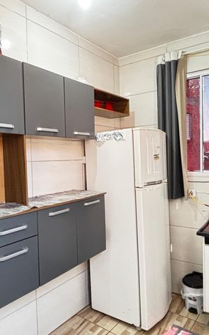 Casa à venda com 36m², 2 quartos e 1 vaga Casa à venda com 36m², 2 quartos e 1 vagaCozinha