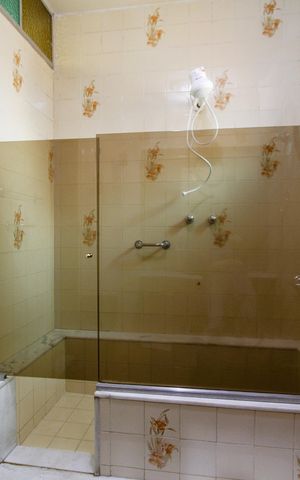 Casa à venda com 370m², 4 quartos e 3 vagasBanheiro da Suíte