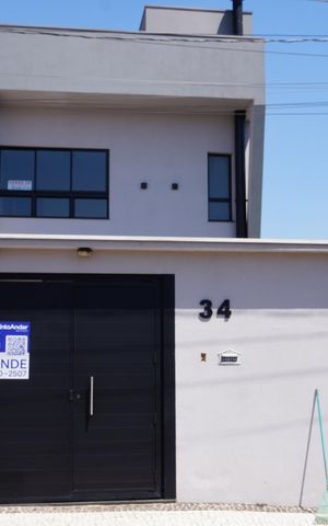 Casa à venda com 160m², 3 quartos e 2 vagasFachada Placa NNQT - 873