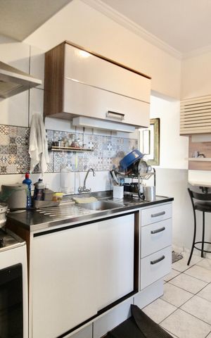 Casa à venda com 210m², 6 quartos e 4 vagas Casa à venda com 210m², 6 quartos e 4 vagasCozinha