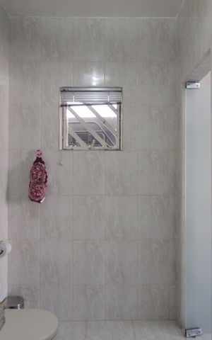 Casa à venda com 290m², 3 quartos e 3 vagasBanheiro da Suite