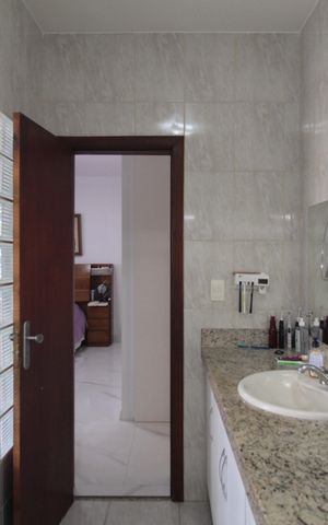 Casa à venda com 290m², 3 quartos e 3 vagasBanheiro da Suite