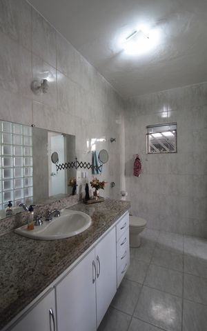 Casa à venda com 290m², 3 quartos e 3 vagasBanheiro da Suite