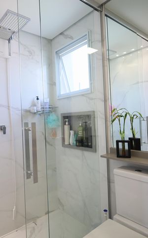 Casa de condomínio à venda com 134m², 3 quartos e 2 vagasBanheiro da Suíte 1