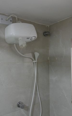 Casa de condomínio para alugar com 350m², 3 quartos e 3 vagasBanheiro da Suíte 1