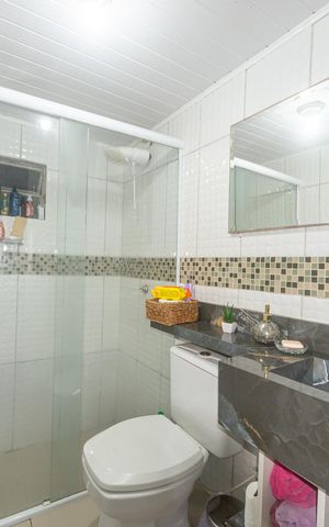 Casa à venda com 112m², 2 quartos e 1 vaga Casa à venda com 112m², 2 quartos e 1 vagaBanheiro