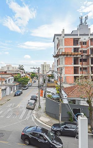 Apartamento à venda com 55m², 2 quartos e 1 vaga Apartamento à venda com 55m², 2 quartos e 1 vagaVista da Sacada do Quarto Suíte