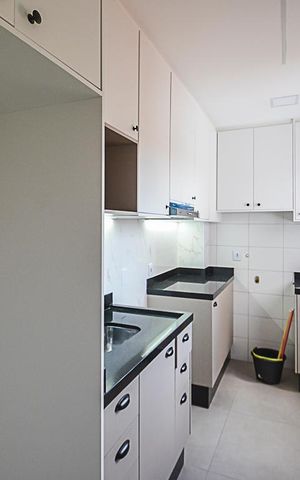 Apartamento à venda com 55m², 2 quartos e 1 vaga Apartamento à venda com 55m², 2 quartos e 1 vagaCozinha e Área de Serviço