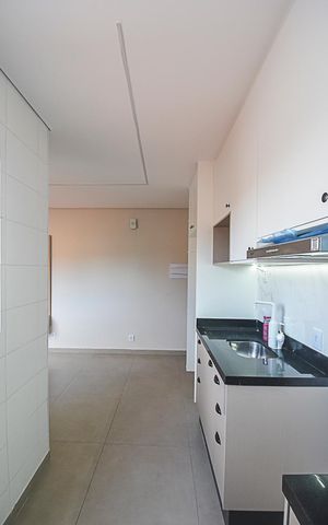 Apartamento à venda com 55m², 2 quartos e 1 vaga Apartamento à venda com 55m², 2 quartos e 1 vagaCozinha e Área de Serviço