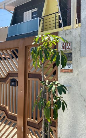 Casa à venda com 181m², 3 quartos e 2 vagasFachada e Placa