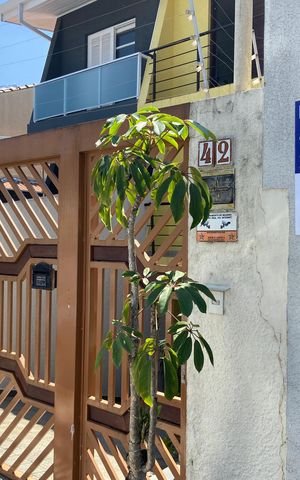 Casa à venda com 181m², 3 quartos e 2 vagasFachada e Placa