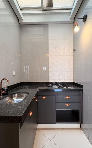 Casa à venda com 151m², 2 quartos e 2 vagas Casa à venda com 151m², 2 quartos e 2 vagasCozinha
