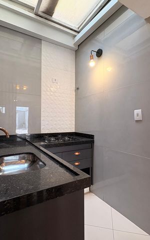 Casa à venda com 151m², 2 quartos e 2 vagas Casa à venda com 151m², 2 quartos e 2 vagasCozinha