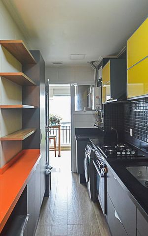 Apartamento à venda com 96m², 2 quartos e 2 vagasCozinha e Área de Serviço