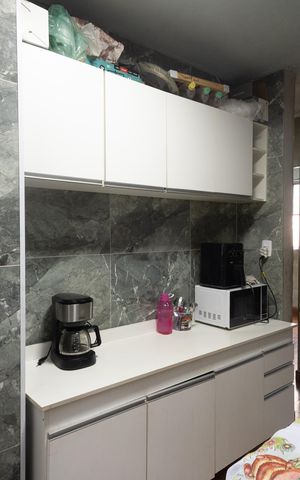 Apartamento à venda com 50m², 2 quartos e 1 vaga Apartamento à venda com 50m², 2 quartos e 1 vagaCozinha e Área de Serviço