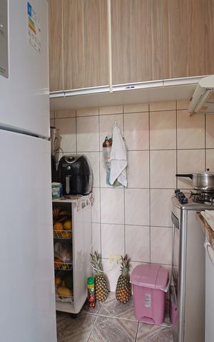 Casa à venda com 46m², 2 quartos e 1 vagaCozinha e Área de Serviço