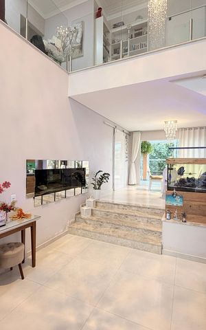 Casa de condomínio para alugar com 400m², 3 quartos e 4 vagasSala