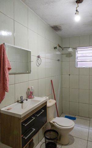 Casa à venda com 250m², 4 quartos e 1 vagaBanheiro