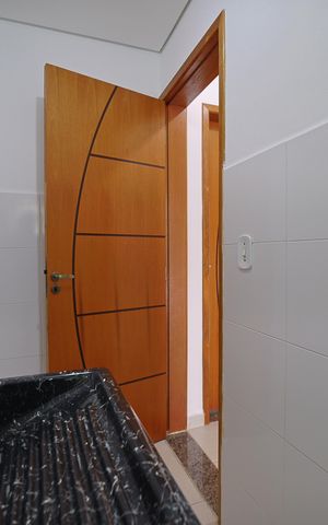 Casa de condomínio à venda com 60m², 2 quartos e 1 vagaÁrea de Serviço