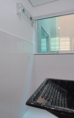 Casa de condomínio à venda com 60m², 2 quartos e 1 vagaÁrea de Serviço