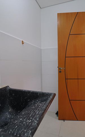 Casa de condomínio à venda com 60m², 2 quartos e 1 vagaÁrea de Serviço