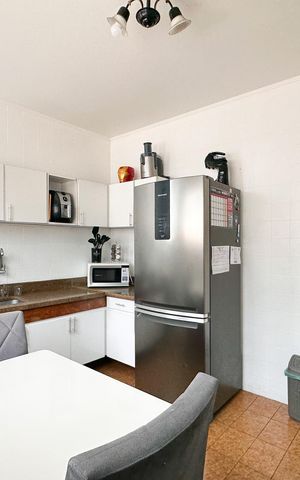 Casa à venda com 116m², 2 quartos e 2 vagas Casa à venda com 116m², 2 quartos e 2 vagasCozinha