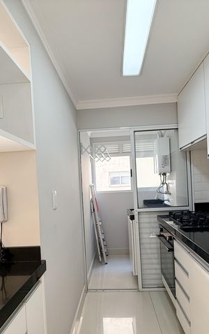 Apartamento para alugar com 50m², 2 quartos e 1 vaga Apartamento para alugar com 50m², 2 quartos e 1 vagaCozinha e Área de Serviço