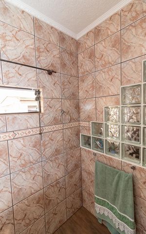 Casa à venda com 125m², 2 quartos e 2 vagas Casa à venda com 125m², 2 quartos e 2 vagasBanheiro da Suíte