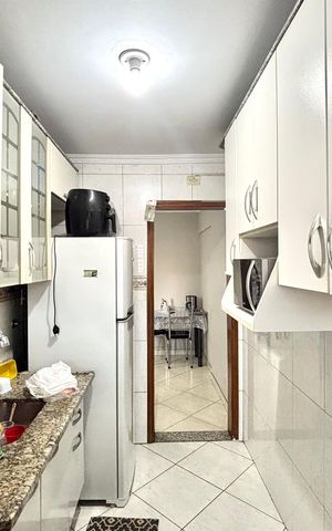 Apartamento à venda com 55m², 2 quartos e 1 vaga Apartamento à venda com 55m², 2 quartos e 1 vagaCozinha