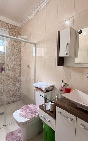 Casa à venda com 125m², 3 quartos e 2 vagasBanheiro Social