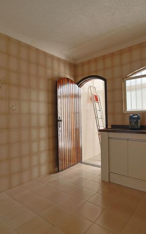 Casa para alugar com 70m², 2 quartos e 2 vagasCozinha