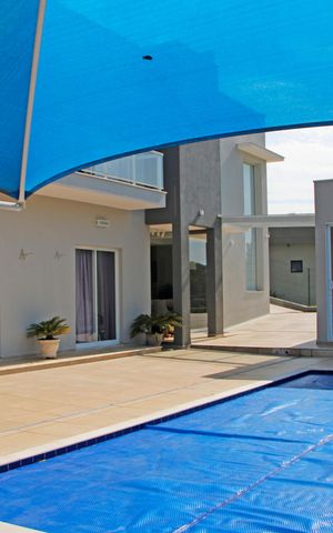 Casa de condomínio à venda com 1024m², 5 quartos e 7 vagasÁrea externa