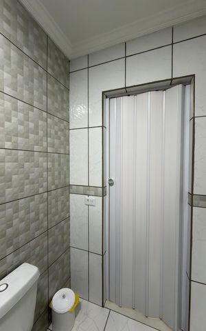 Casa à venda com 141m², 3 quartos e 2 vagas Casa à venda com 141m², 3 quartos e 2 vagasQuarto 2 - Suíte Banheiro