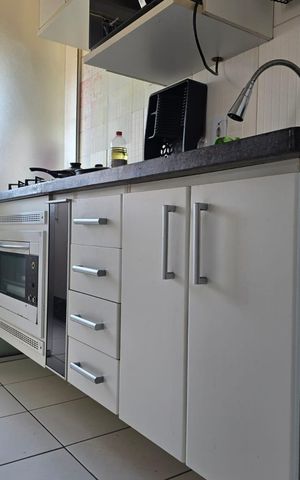 Apartamento à venda com 45m², 2 quartos e 1 vaga Apartamento à venda com 45m², 2 quartos e 1 vagaCozinha e Área de Serviço
