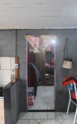 Casa à venda com 50m², 4 quartos e 6 vagasSala/Cozinha