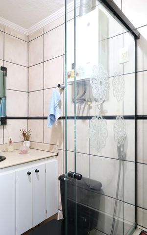 Casa à venda com 147m², 2 quartos e 2 vagasBanheiro da Suíte 1