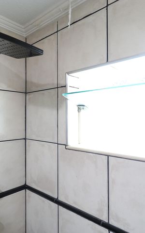 Casa à venda com 147m², 2 quartos e 2 vagasBanheiro da Suíte 1