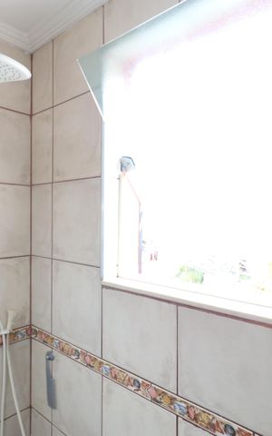 Casa à venda com 147m², 2 quartos e 2 vagasBanheiro da Suíte 2