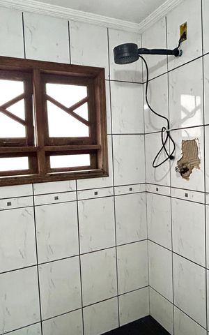 Casa à venda com 254m², 3 quartos e 2 vagasBanheiro da Suíte