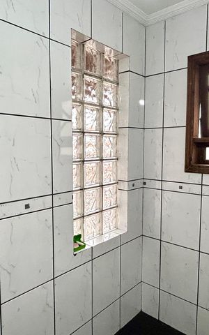Casa à venda com 254m², 3 quartos e 2 vagasBanheiro da Suíte
