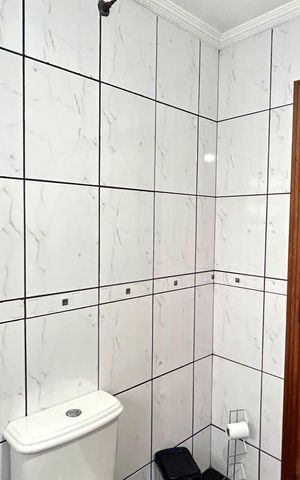 Casa à venda com 254m², 3 quartos e 2 vagasBanheiro da Suíte