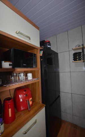 Casa para alugar com 90m², 2 quartos e sem vagaCozinha e Área de Serviço
