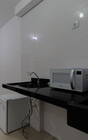 Apartamento à venda com 38m², 2 quartos e 1 vaga Apartamento à venda com 38m², 2 quartos e 1 vagaCozinha e área de serviço