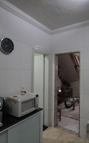 Casa de condomínio à venda com 70m², 2 quartos e 1 vagaCozinha e Área de Serviço