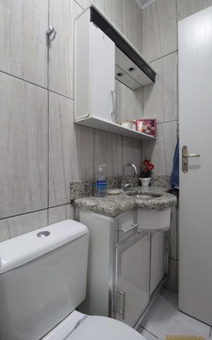Casa de condomínio à venda com 70m², 2 quartos e 1 vagaBanheiro Social 2