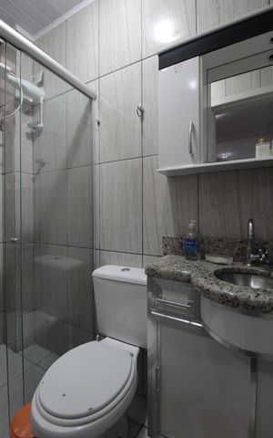 Casa de condomínio à venda com 70m², 2 quartos e 1 vagaBanheiro Social 2
